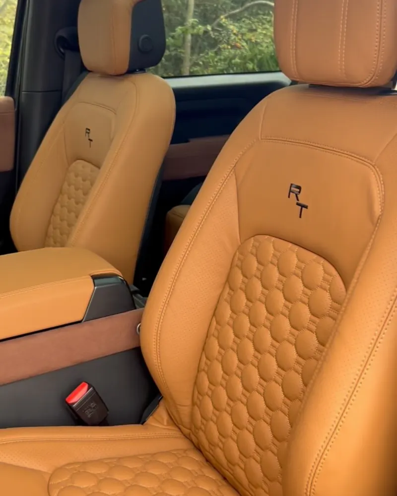 A Defender 90 re-trimmed in tan Italian leather with honeycomb quilting
